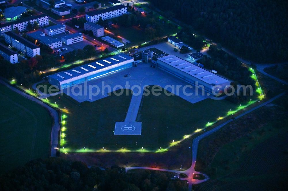 Ahrensfelde at night from the bird perspective: Night lighting Helicopter landing pad - airfield for helicopters of the Federal Police Aviation Squadron Blumberg on Neuer Schwanebecker Weg in the district of Blumberg in Ahrensfelde in the federal state of Brandenburg