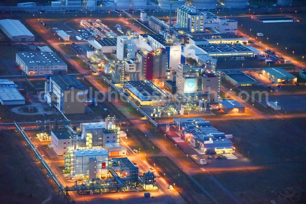 Aerial photograph at night Bitterfeld-Wolfen - Night lighting Refinery equipment and management systems on the factory premises of the chemical manufacturers of Bayer Bitterfeld GmbH in Chemiepark in the district Greppin in Bitterfeld-Wolfen in the state Saxony-Anhalt