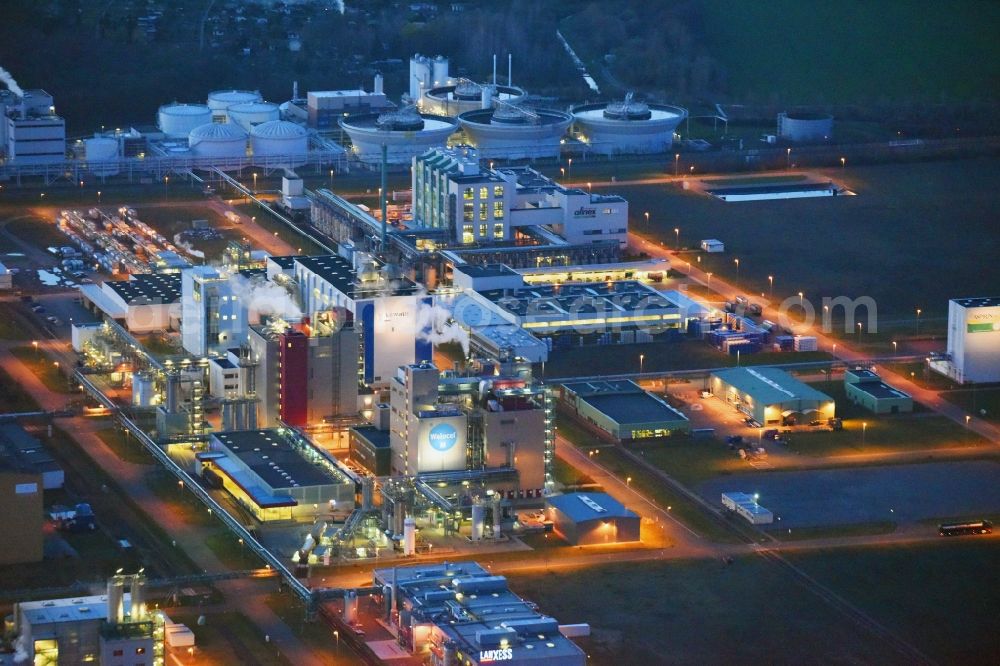 Aerial image at night Bitterfeld-Wolfen - Night lighting Refinery equipment and management systems on the factory premises of the chemical manufacturers of Bayer Bitterfeld GmbH in Chemiepark in the district Greppin in Bitterfeld-Wolfen in the state Saxony-Anhalt