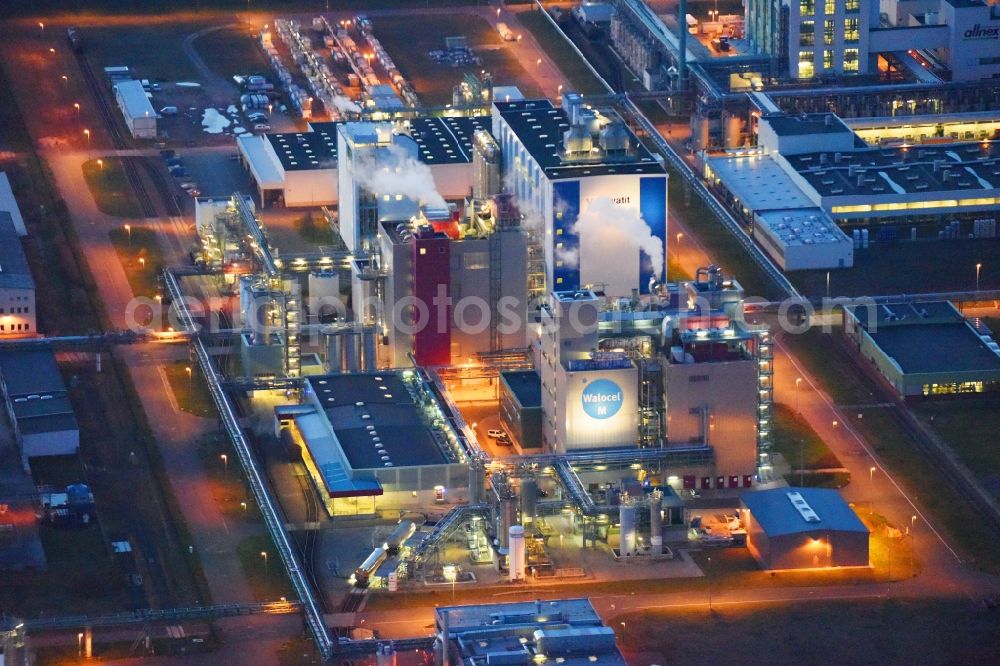 Aerial image at night Bitterfeld-Wolfen - Night lighting Refinery equipment and management systems on the factory premises of the chemical manufacturers of Bayer Bitterfeld GmbH in Chemiepark in the district Greppin in Bitterfeld-Wolfen in the state Saxony-Anhalt