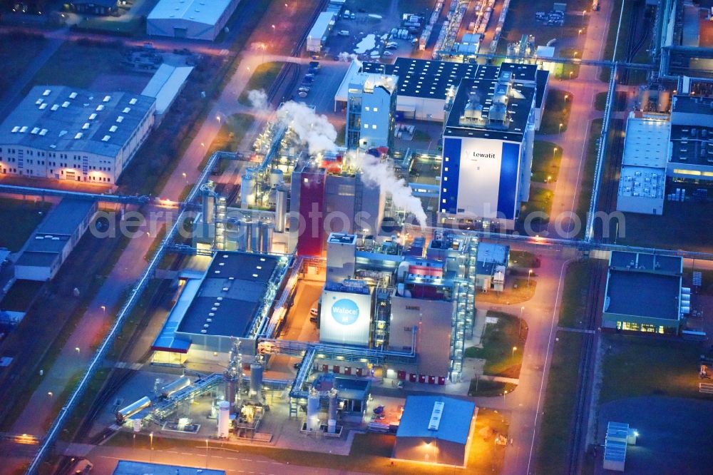 Aerial image at night Bitterfeld-Wolfen - Night lighting Refinery equipment and management systems on the factory premises of the chemical manufacturers of Bayer Bitterfeld GmbH in Chemiepark in the district Greppin in Bitterfeld-Wolfen in the state Saxony-Anhalt