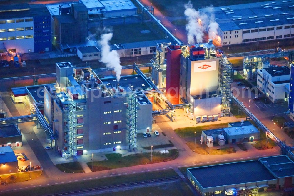 Bitterfeld-Wolfen at night from above - Night lighting Refinery equipment and management systems on the factory premises of the chemical manufacturers Dow Deutschlond Anlagengesellschaft mbH in the district Greppin in Bitterfeld-Wolfen in the state Saxony-Anhalt