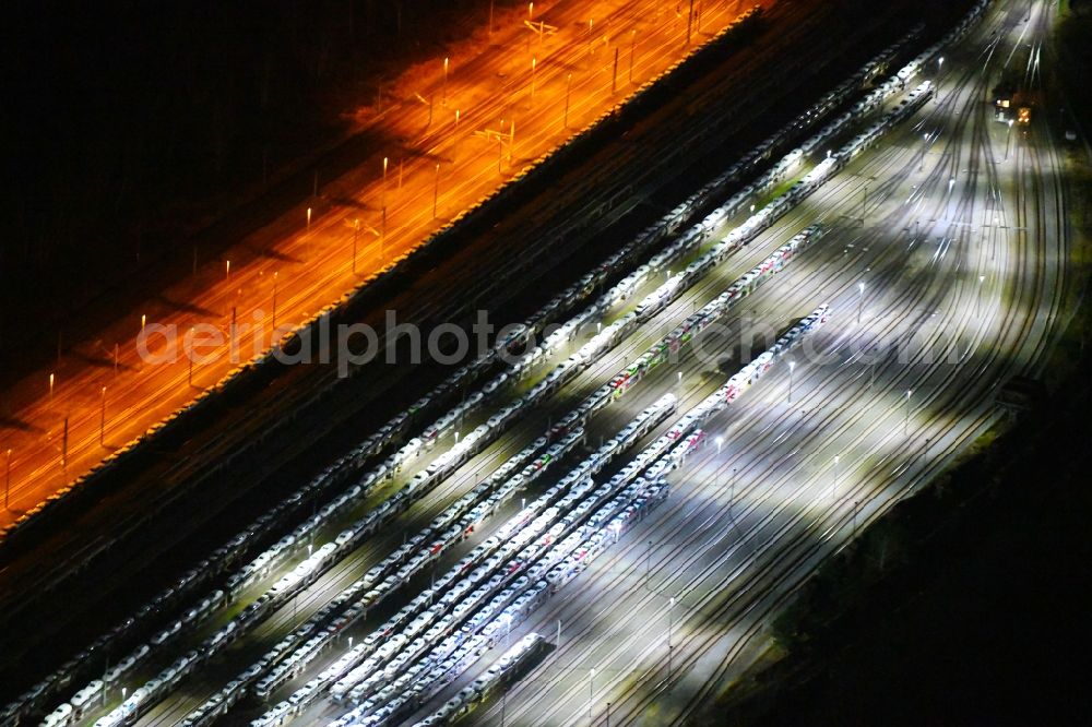 Aerial photograph at night Falkenberg/Elster - Night lighting Marshalling yard and freight station of the Deutsche Bahn in Falkenberg/Elster in the state Brandenburg, Germany