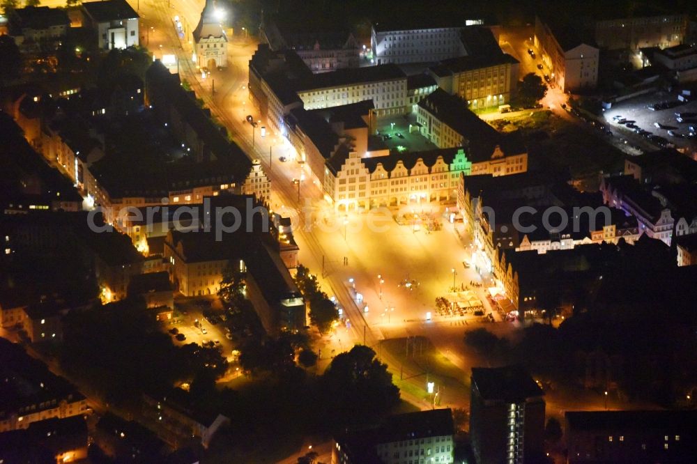 Rostock at night from above - Night lighting Town Hall building of the city administration on Neuer Markt in Rostock in the state Mecklenburg - Western Pomerania, Germany