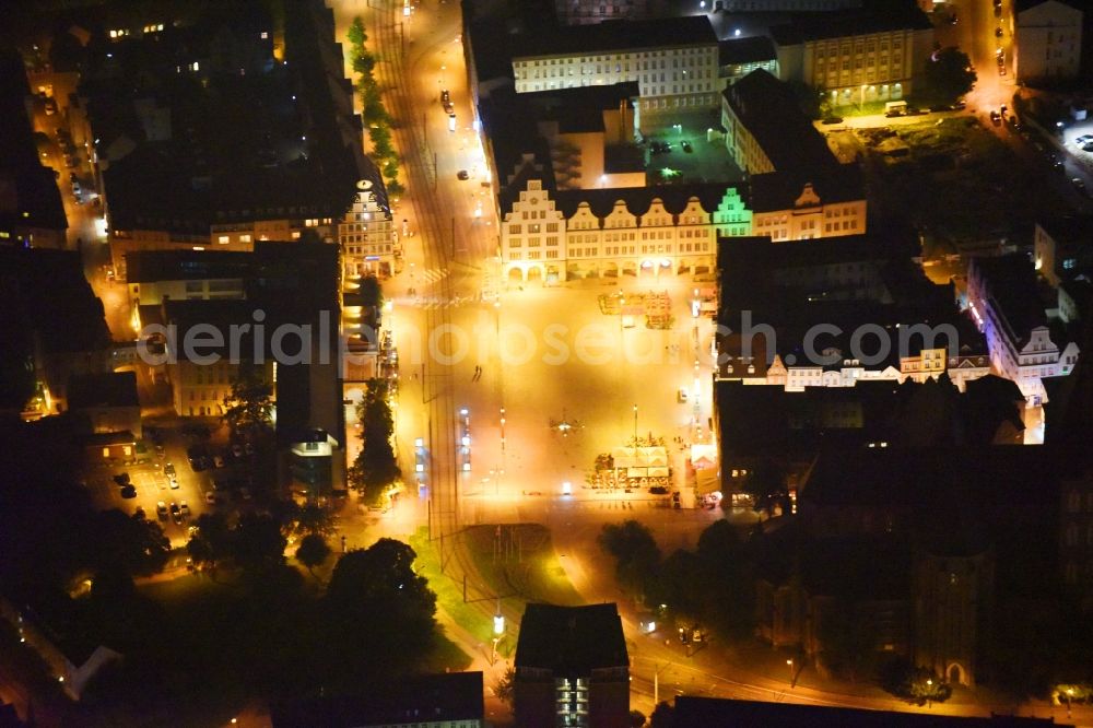 Rostock at night from the bird perspective: Night lighting Town Hall building of the city administration on Neuer Markt in Rostock in the state Mecklenburg - Western Pomerania, Germany