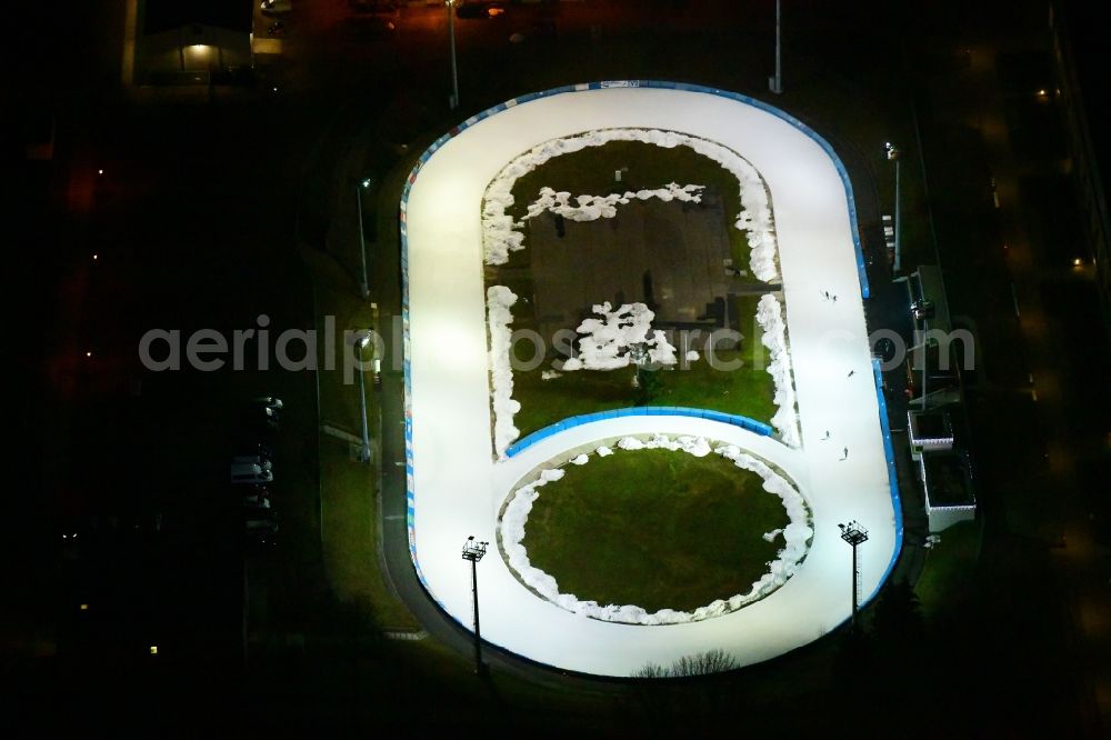 Aerial photograph at night Dresden - Night lighting racetrack racecourse of Dresdner Eislauf-Club e.V. on Pieschener Allee in the district Friedrichstadt in Dresden in the state Saxony, Germany