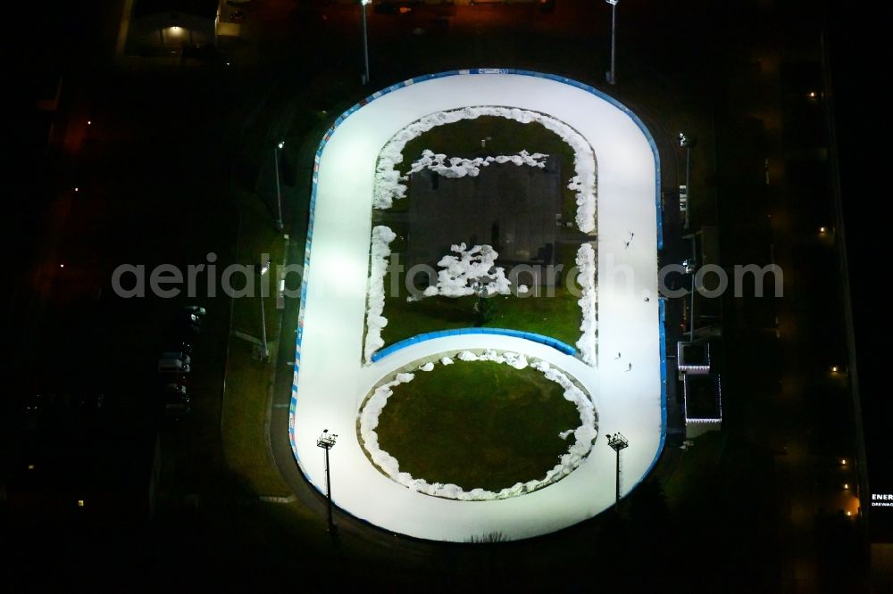 Aerial image at night Dresden - Night lighting racetrack racecourse of Dresdner Eislauf-Club e.V. on Pieschener Allee in the district Friedrichstadt in Dresden in the state Saxony, Germany