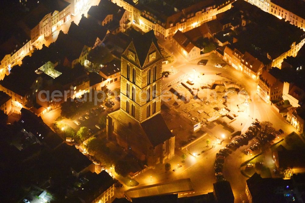 Wismar at night from the bird perspective: Night lighting Ruins of church building Marienkirche in Wismar in the state Mecklenburg - Western Pomerania, Germany