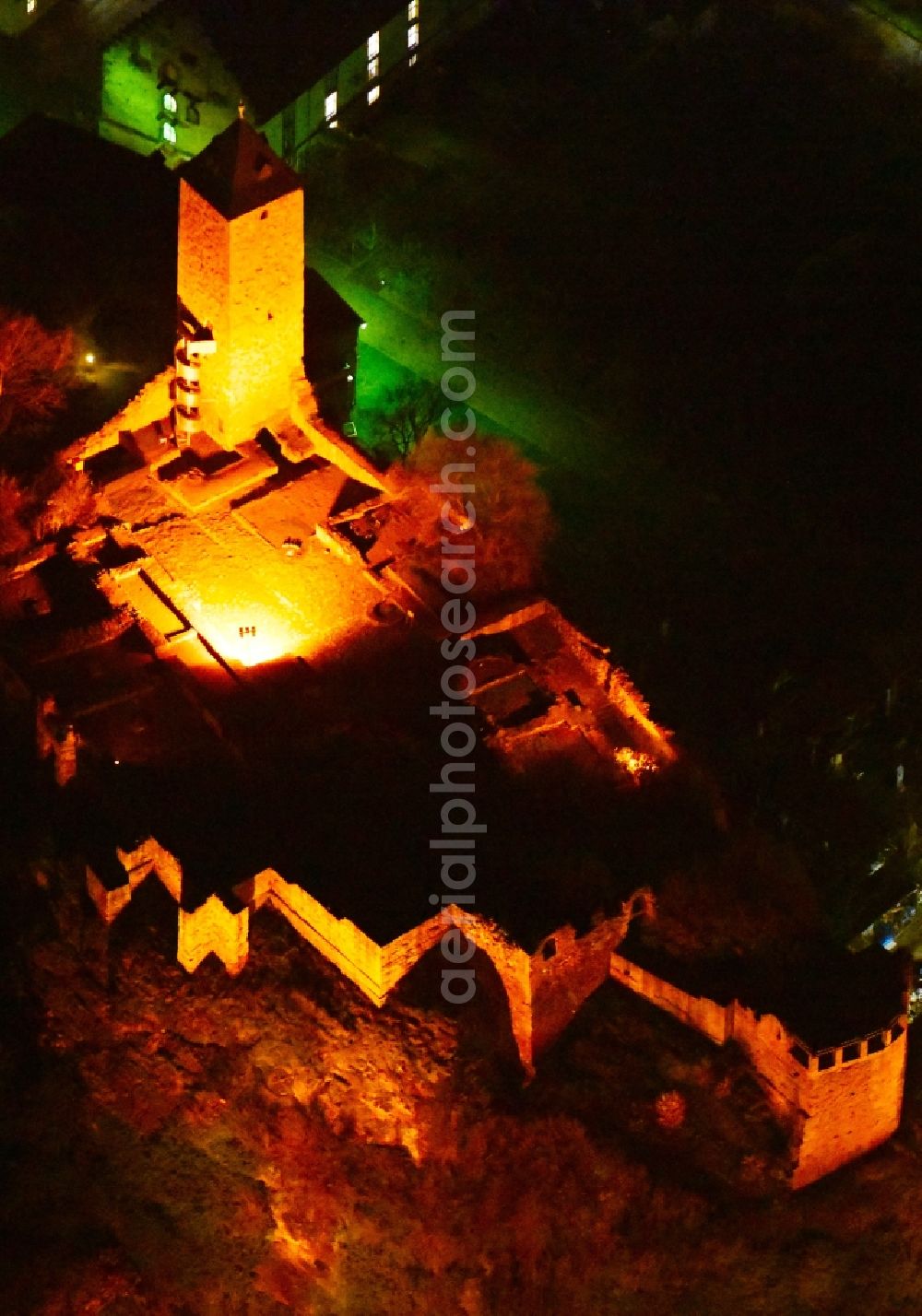 Halle (Saale) at night from above - Night lighting Ruins and vestiges of the former castle and fortress Burg Giebichenstein on Seebener Strasse in Halle (Saale) in the state Saxony-Anhalt