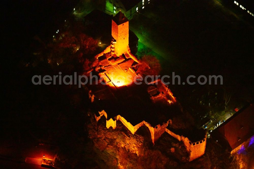 Halle (Saale) at night from the bird perspective: Night lighting Ruins and vestiges of the former castle and fortress Burg Giebichenstein on Seebener Strasse in Halle (Saale) in the state Saxony-Anhalt