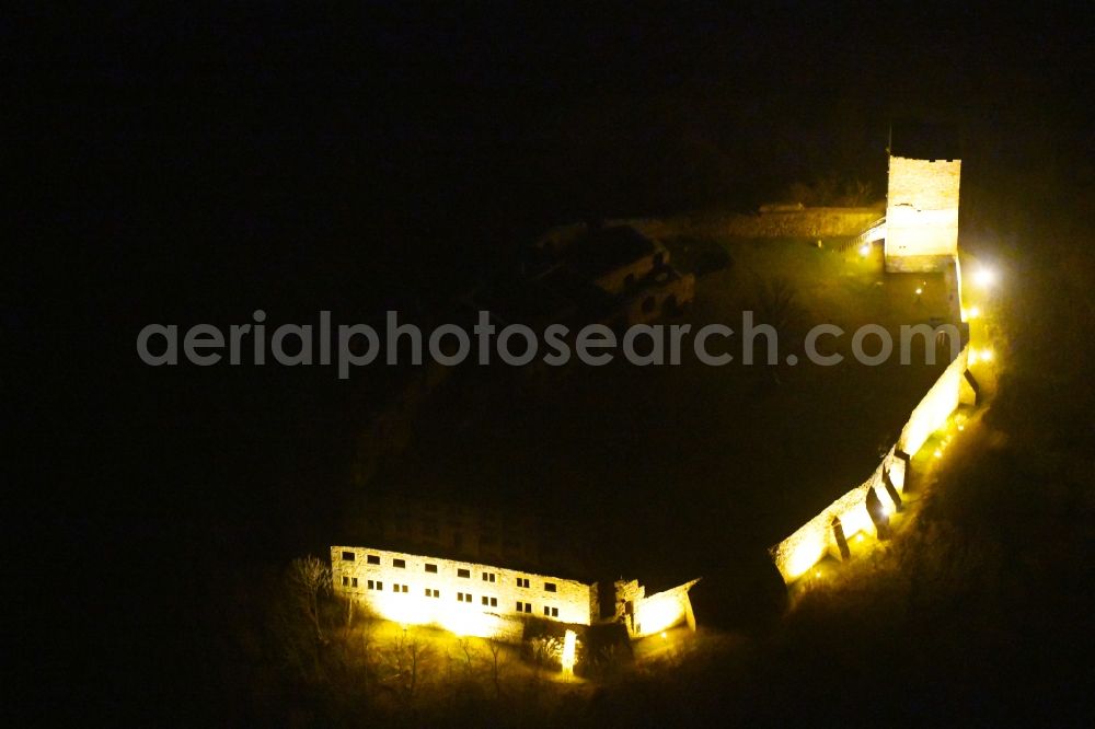 Aerial image at night Drei Gleichen - Night lighting Ruins and vestiges of the former castle and fortress Burg Gleichen on Thomas-Muentzer-Strasse in the district Wandersleben in Drei Gleichen in the state Thuringia, Germany