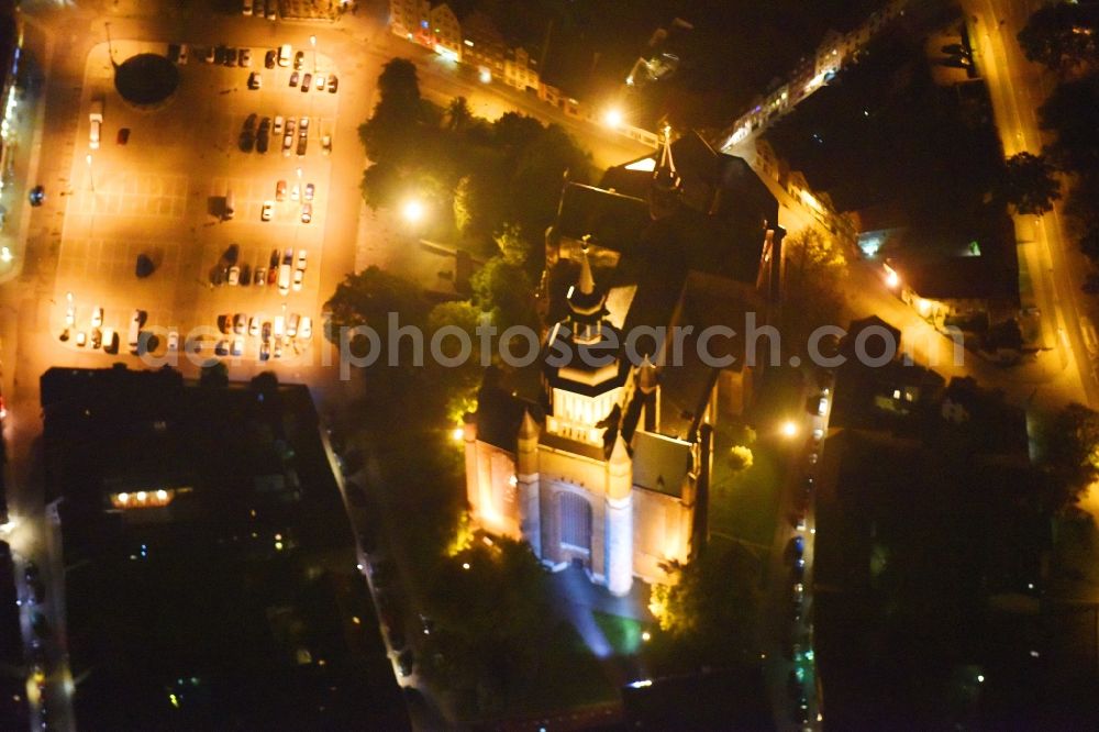 Aerial photograph at night Stralsund - Night lighting Saint Mary's Church in the city of Stralsund in Mecklenburg-Vorpommern