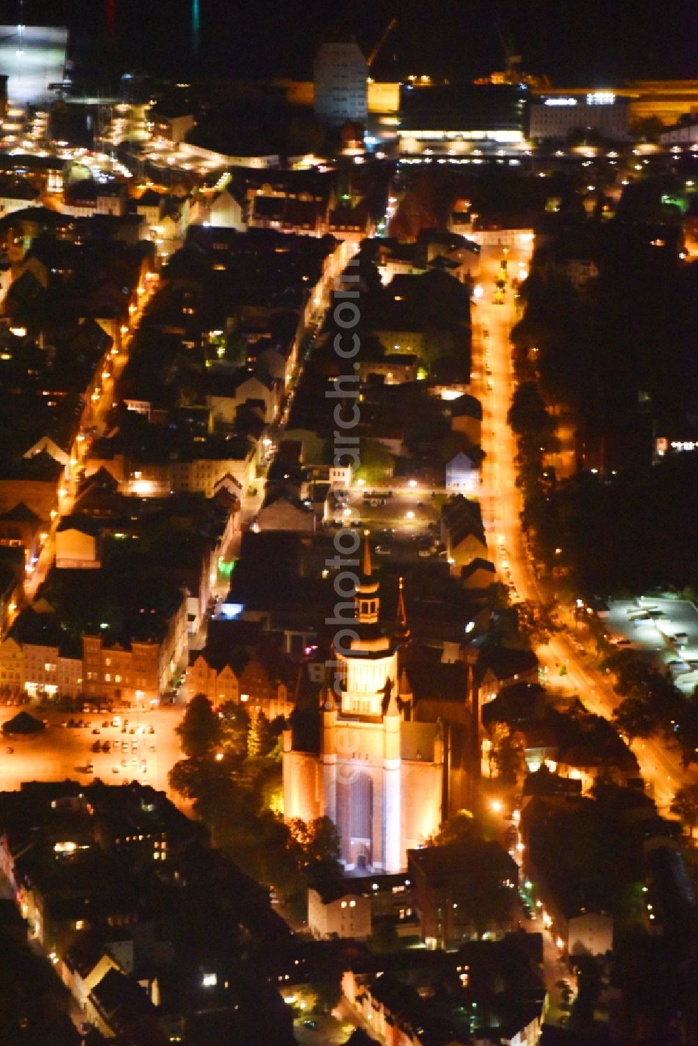 Aerial photograph at night Stralsund - Night lighting Saint Mary's Church in the city of Stralsund in Mecklenburg-Vorpommern