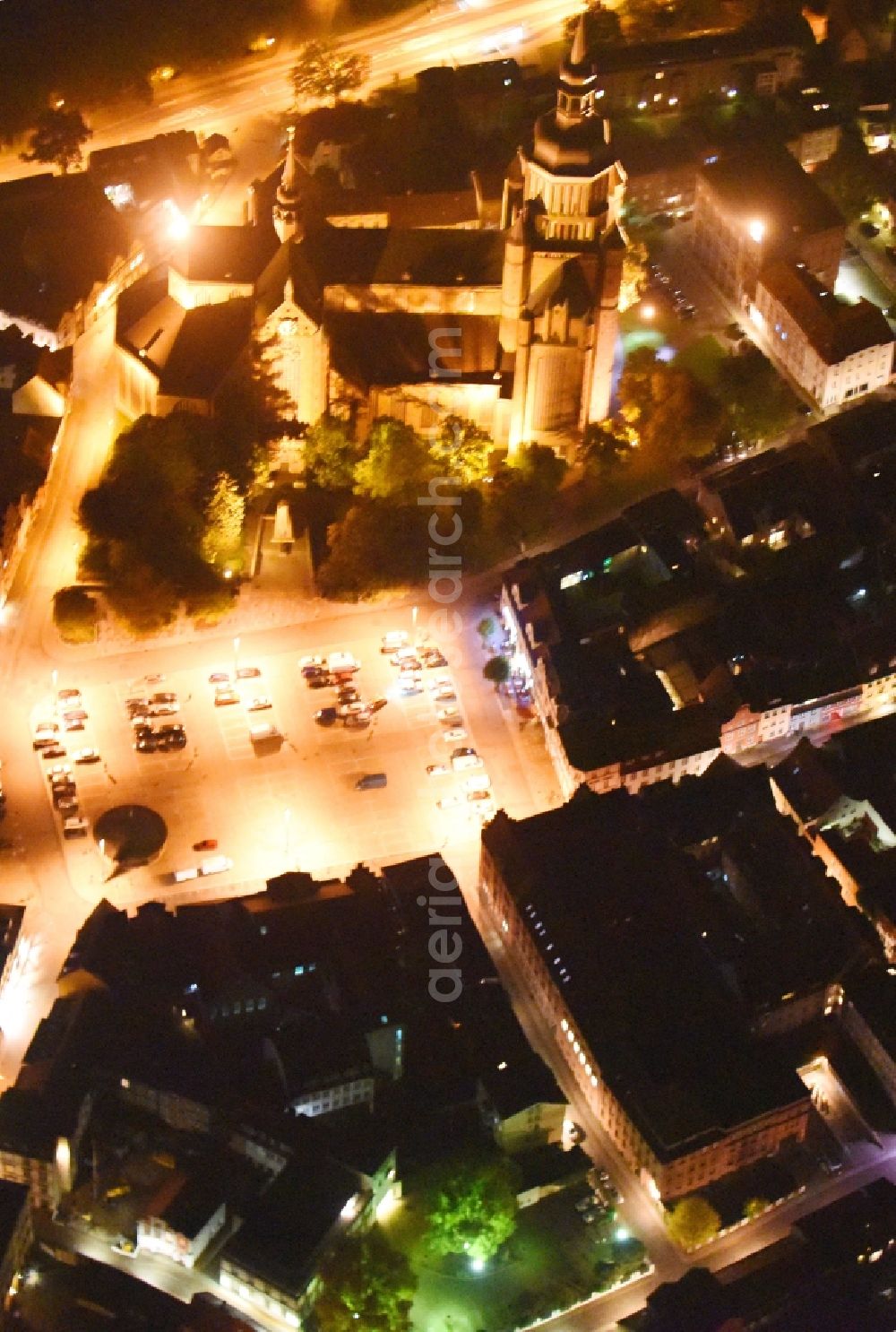 Stralsund at night from the bird perspective: Night lighting Saint Mary's Church in the city of Stralsund in Mecklenburg-Vorpommern