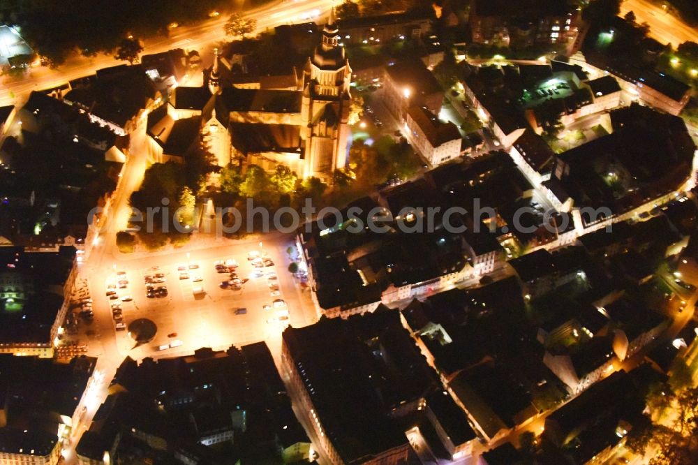 Aerial photograph at night Stralsund - Night lighting Saint Mary's Church in the city of Stralsund in Mecklenburg-Vorpommern