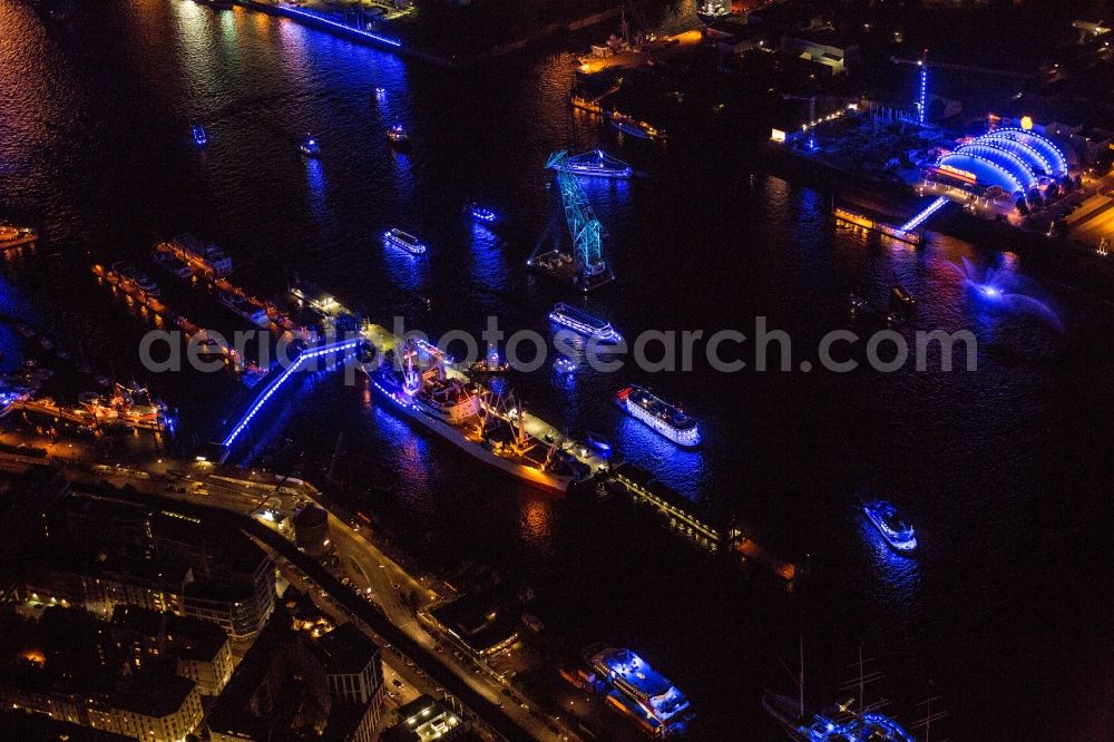 Aerial photograph at night Hamburg - Night view Boat traffic on the river Elbe towards the construction site for the new building of the new Musical Theatre Stage Entertainment in Hamburg