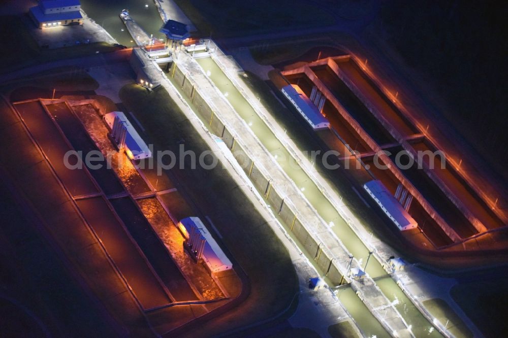 Aerial image at night Hohenwarthe - Night lighting Locks - plants on the banks of the waterway in Hohenwarthe in the state Saxony-Anhalt