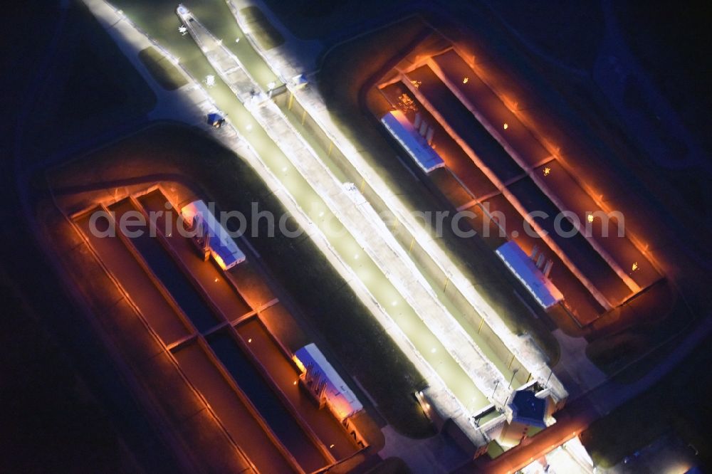 Aerial image at night Hohenwarthe - Night lighting Locks - plants on the banks of the waterway in Hohenwarthe in the state Saxony-Anhalt