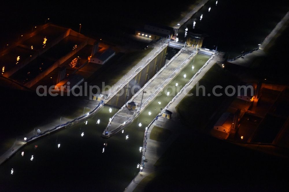 Aerial image at night Hohenwarthe - Night lighting Locks - plants on the banks of the waterway in Hohenwarthe in the state Saxony-Anhalt