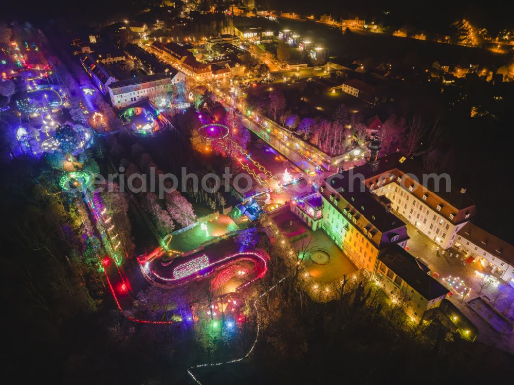 Aerial photograph at night Lichtenwalde - Night lights and lighting LUMAGICA building complex in the castle park of castle Schloss und Park Lichtenwalde in Lichtenwalde in the federal state of Saxony, Germany