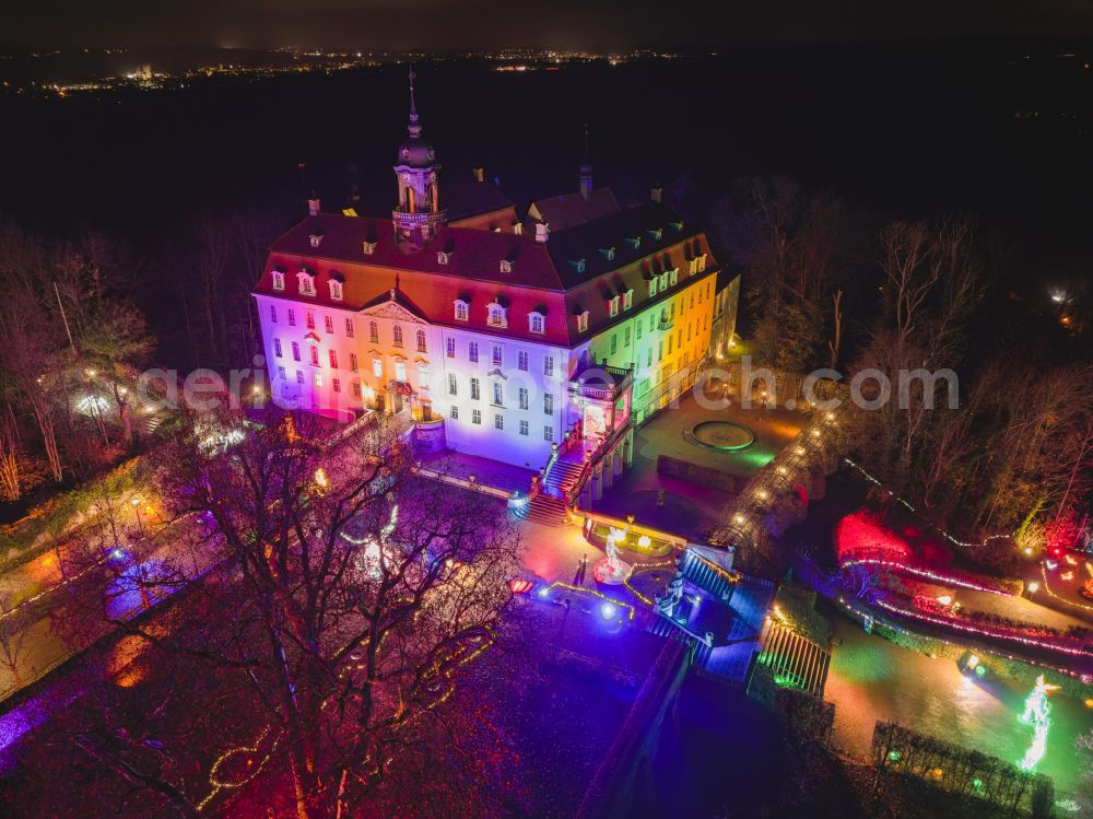 Aerial image at night Lichtenwalde - Night lights and lighting LUMAGICA building complex in the castle park of castle Schloss und Park Lichtenwalde in Lichtenwalde in the federal state of Saxony, Germany