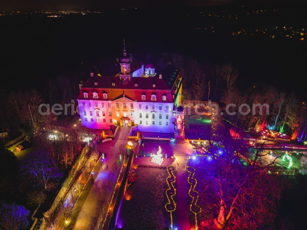 Lichtenwalde at night from above - Night lights and lighting LUMAGICA building complex in the castle park of castle Schloss und Park Lichtenwalde in Lichtenwalde in the federal state of Saxony, Germany