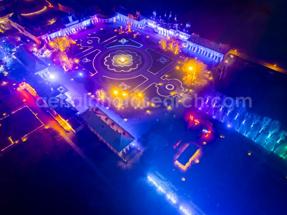 Aerial photograph at night Dresden - Night lighting building complex in the park of the castle Schlosspark Pillnitz on street August-Boeckstiegel-Strasse in the district Pillnitz in Dresden in the state Saxony, Germany