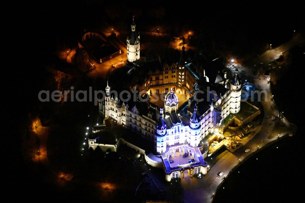 Schwerin at night from the bird perspective: Night lighting schwerin Castle in the state capital of Mecklenburg-Western Pomerania