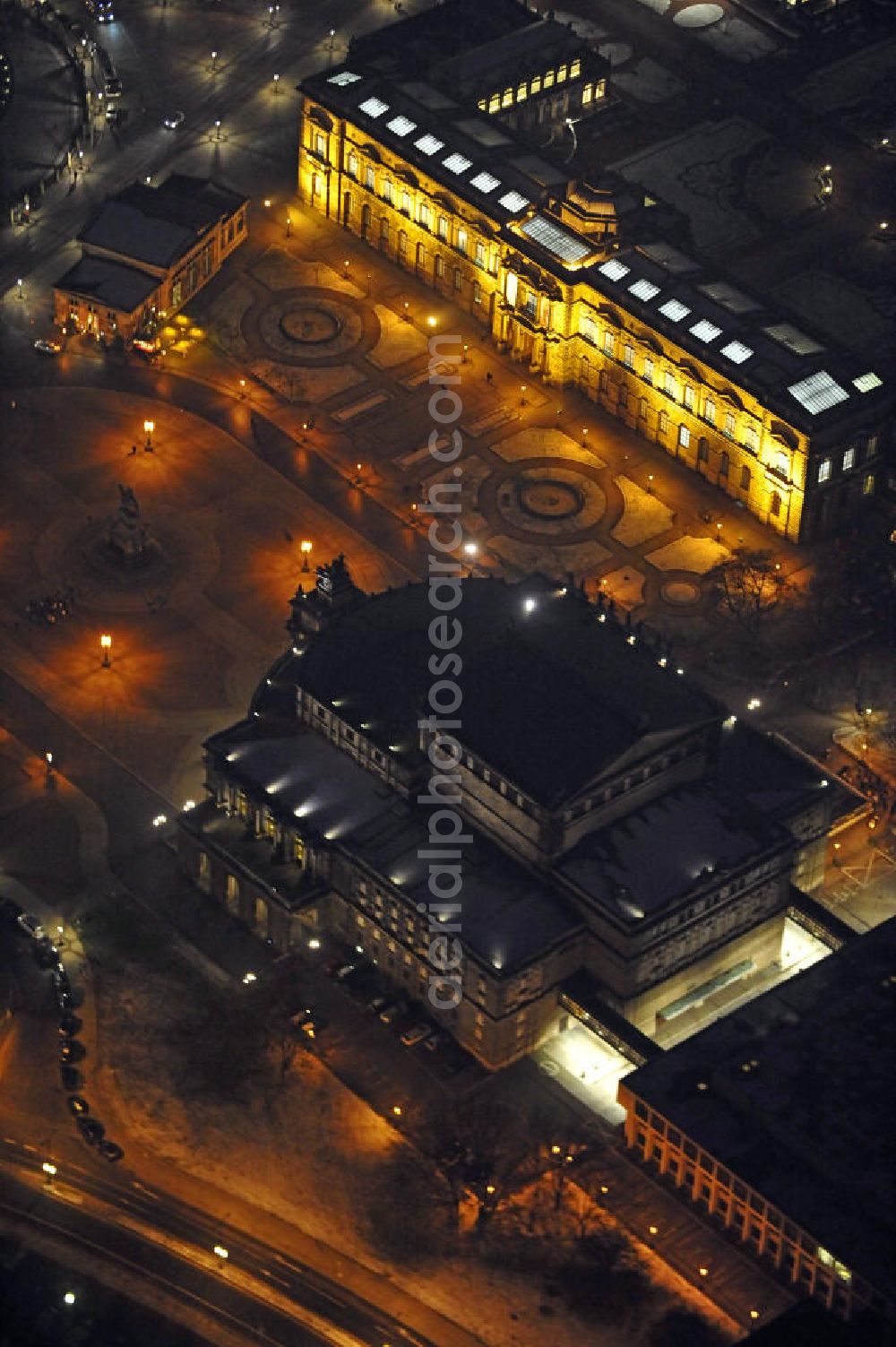 Aerial image at night Dresden - Nachtaufnahme der Semperoper am Theaterplatz in der Altstadt. Das Opernhaus wurde zwischen 1871 und 1878 nach Plänen des Architekten Gottfried Semper errichtet. Night shot of the Semper Opera at the Theatre Square in Old Town.