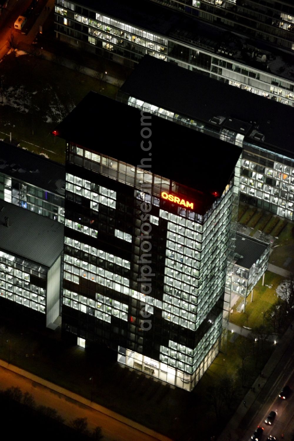 Aerial image at night München - Night lighting administration building of the company of OSRAM GmbH on Marcel-Breuer-Strasse in the district Schwabing-Freimann in Munich in the state Bavaria, Germany