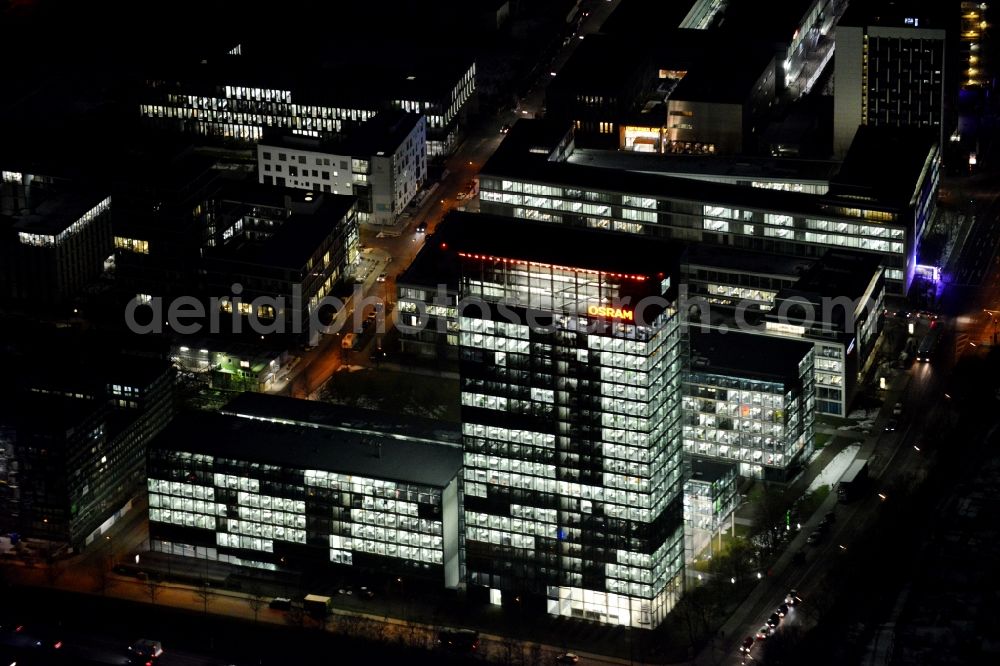 Aerial image at night München - Night lighting administration building of the company of OSRAM GmbH on Marcel-Breuer-Strasse in the district Schwabing-Freimann in Munich in the state Bavaria, Germany