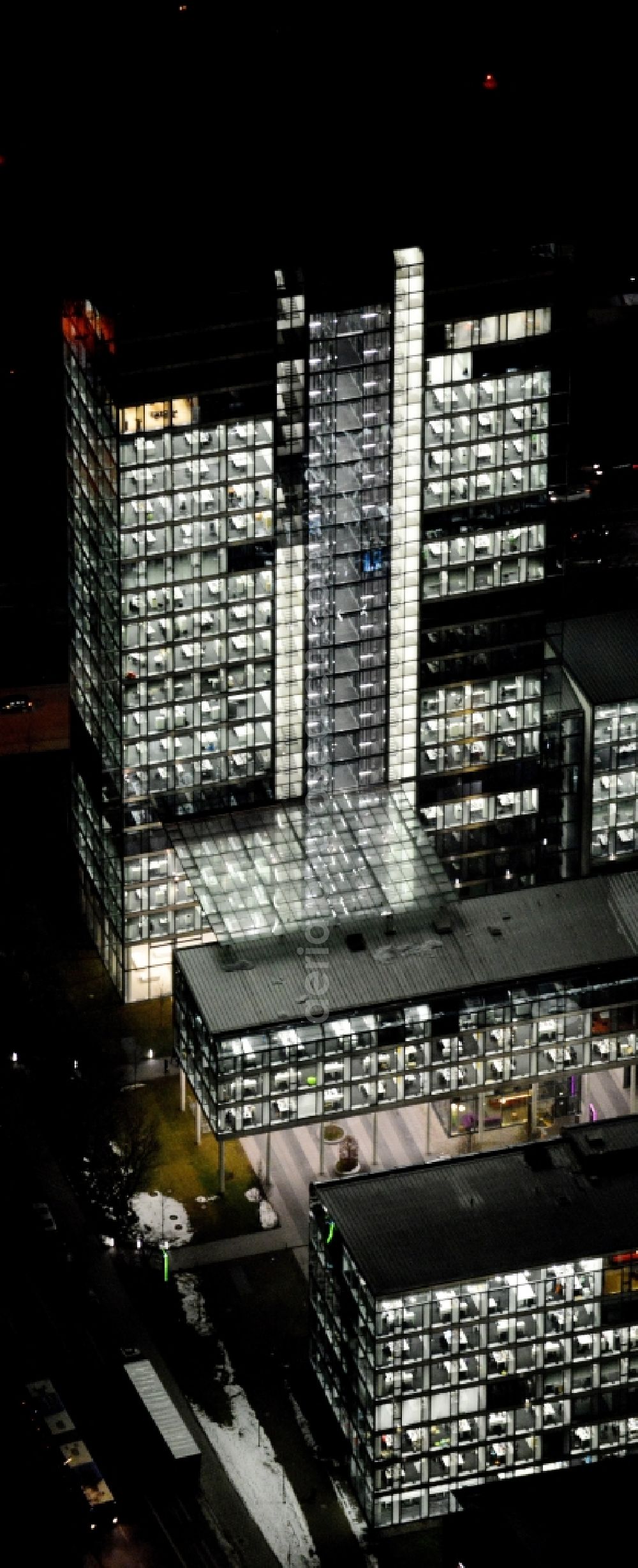 Aerial photograph at night München - Night lighting administration building of the company of OSRAM GmbH on Marcel-Breuer-Strasse in the district Schwabing-Freimann in Munich in the state Bavaria, Germany