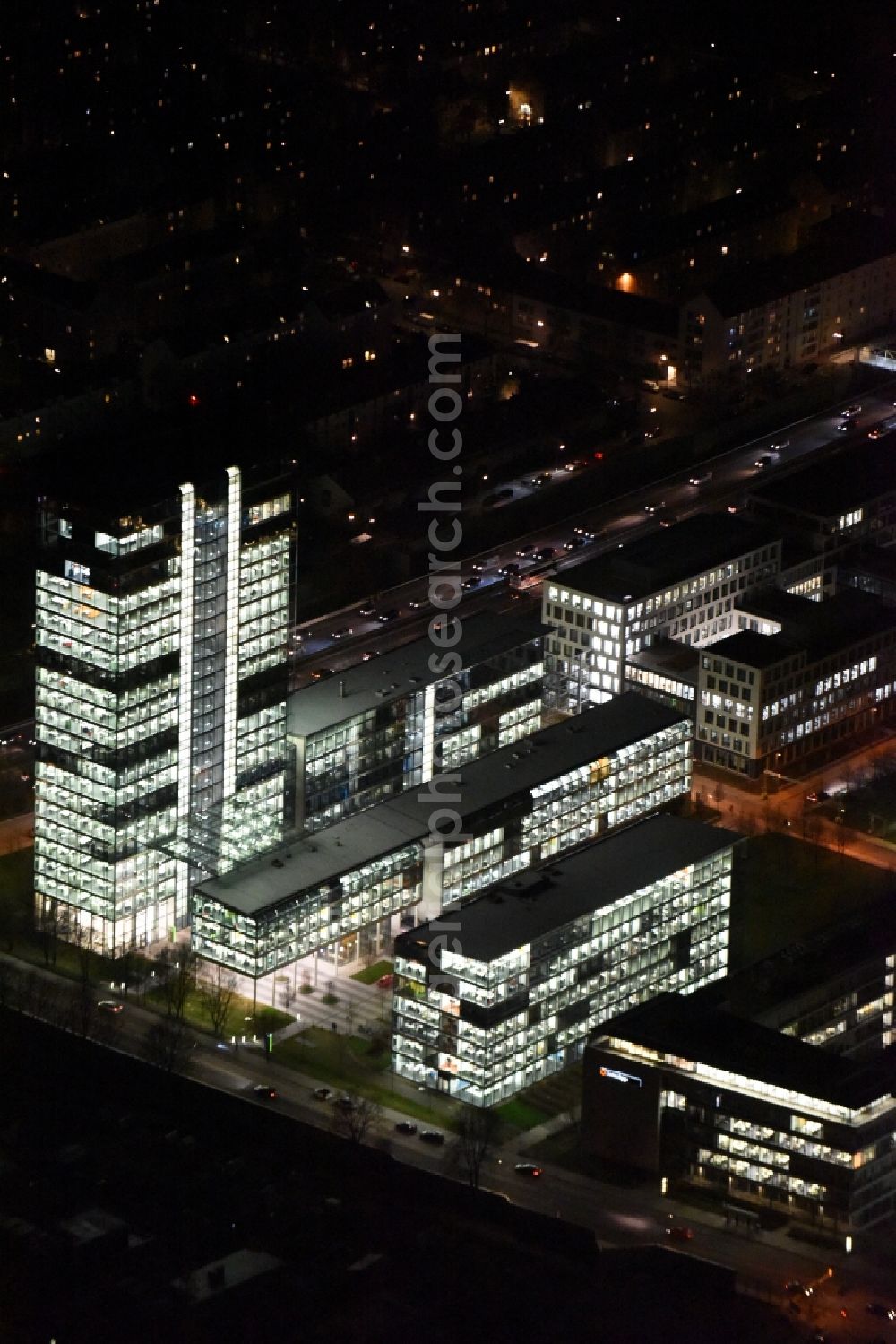 München at night from above - Night lighting administration building of the company of OSRAM GmbH on Marcel-Breuer-Strasse in the district Schwabing-Freimann in Munich in the state Bavaria, Germany