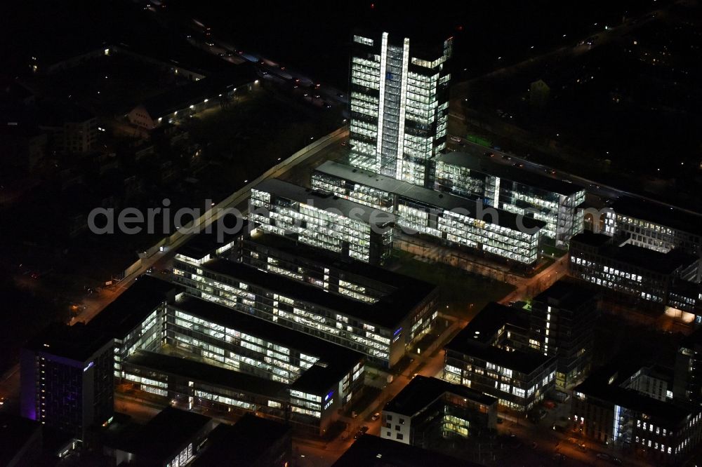 Aerial photograph at night München - Night lighting administration building of the company of OSRAM GmbH on Marcel-Breuer-Strasse in the district Schwabing-Freimann in Munich in the state Bavaria, Germany