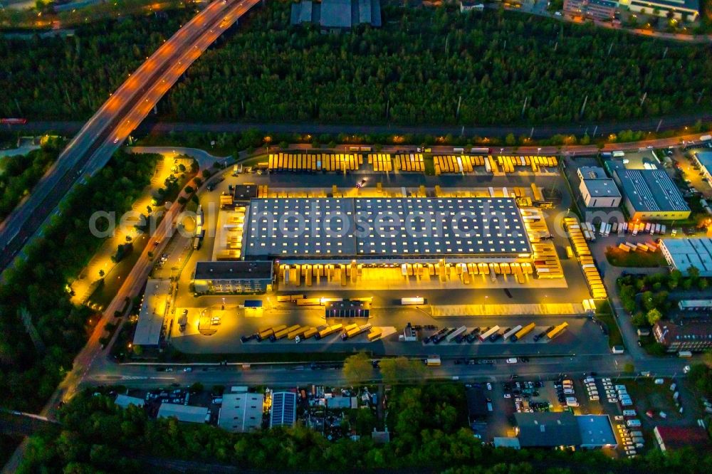 Dortmund at night from above - Night lighting freight forwarding building a logistics and transport company DACHSER SE in the district Union in Dortmund at Ruhrgebiet in the state North Rhine-Westphalia, Germany