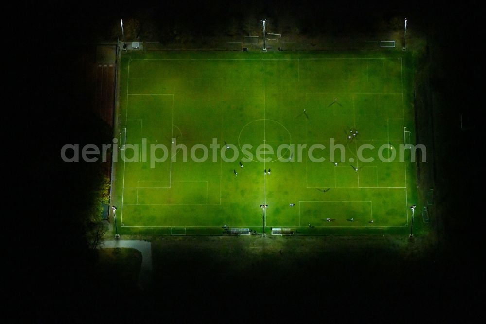 Beeskow at night from above - Night lighting Sports grounds and football pitch of Athletic Club Beeskow e.V. in Beeskow in the state Brandenburg, Germany