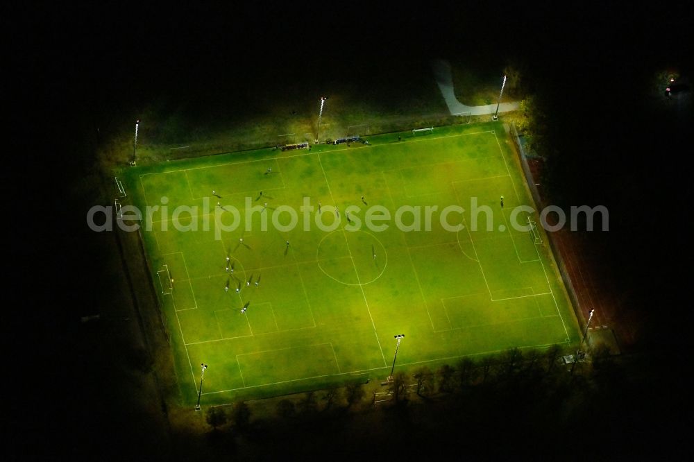 Beeskow at night from above - Night lighting Sports grounds and football pitch of Athletic Club Beeskow e.V. in Beeskow in the state Brandenburg, Germany