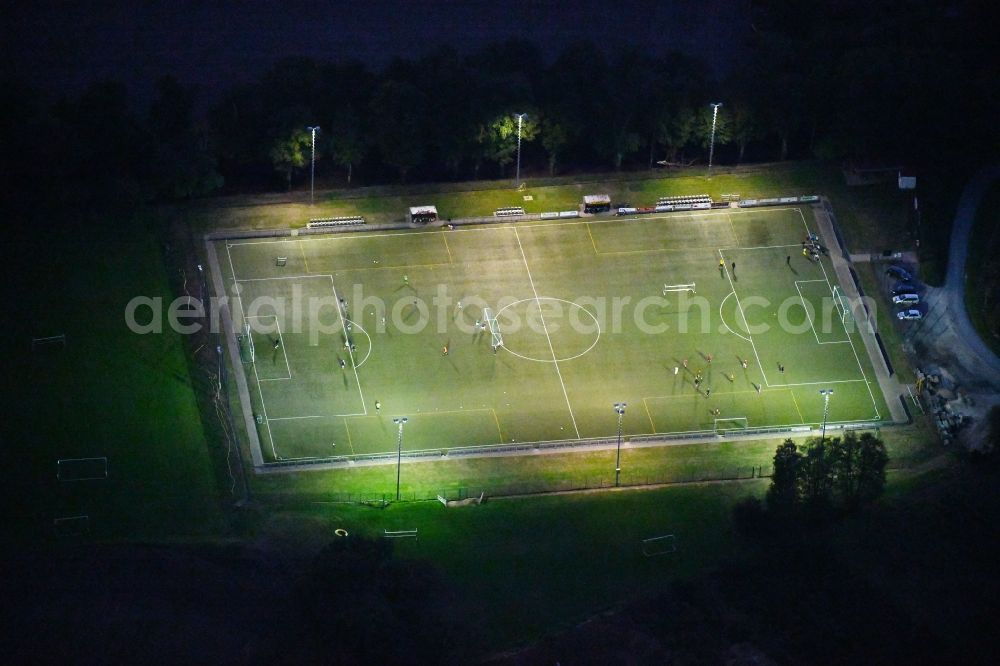 Aerial photograph at night Bad Iburg - Night lighting Sports grounds and football pitch TuS Glane 1929 e.V. in Bad Iburg in the state Lower Saxony, Germany