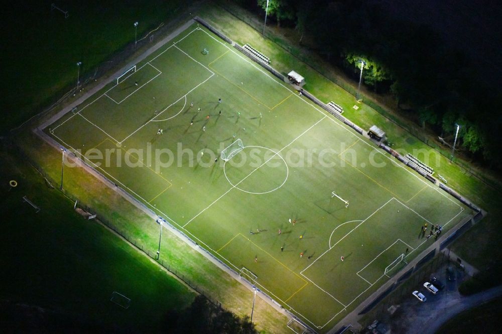 Bad Iburg at night from above - Night lighting Sports grounds and football pitch TuS Glane 1929 e.V. in Bad Iburg in the state Lower Saxony, Germany