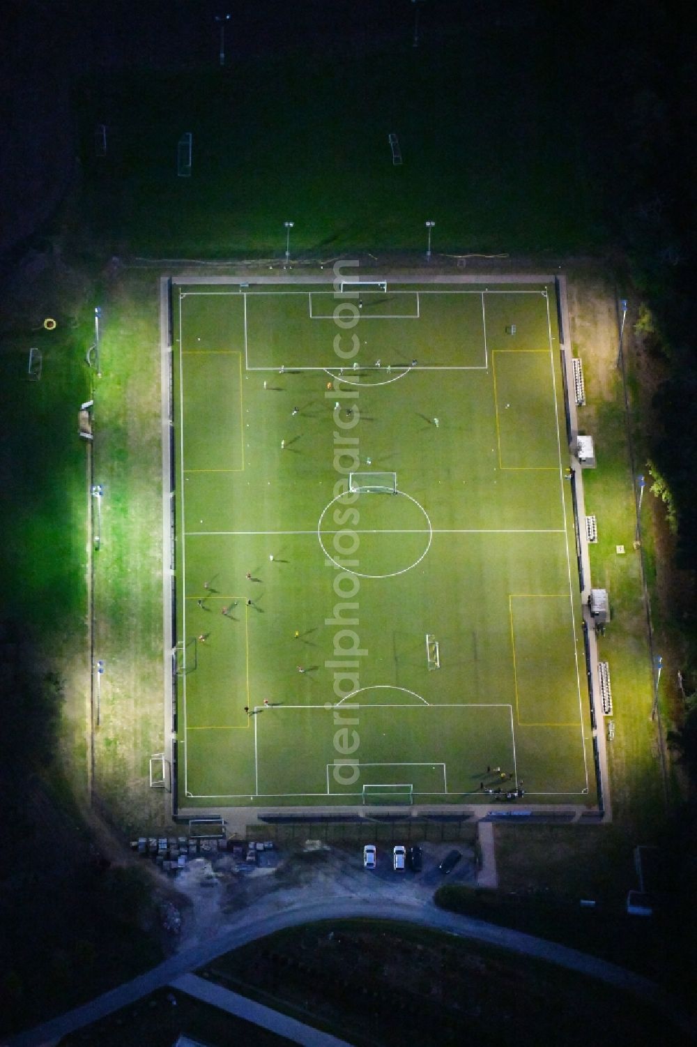 Aerial photograph at night Bad Iburg - Night lighting Sports grounds and football pitch TuS Glane 1929 e.V. in Bad Iburg in the state Lower Saxony, Germany