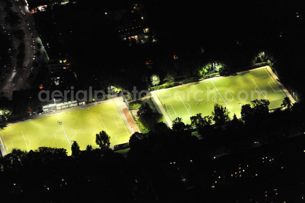 Aerial photograph at night Berlin - Nachtaufnahme: Sportplatz / Fußballplatz im Volkspark Wilmersdorf Schoelerpark. Night shot: Sports area / football ground / soccer field in the public park Wilmersdorf.