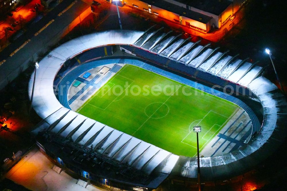 Braunschweig at night from above - Night lighting Sports facility grounds of the Arena stadium in Braunschweig in the state Lower Saxony