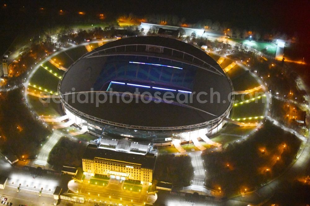 Aerial photograph at night Leipzig - Night lighting Sports facility grounds of the Arena stadium Red Bull Arena Am Sportforum in Leipzig in the state Saxony