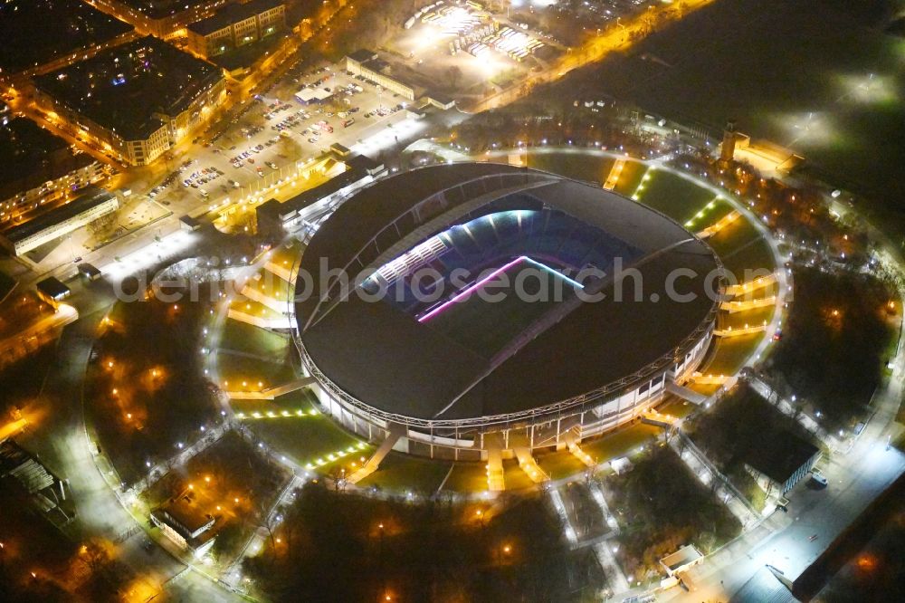 Leipzig at night from above - Night lighting Sports facility grounds of the Arena stadium Red Bull Arena Am Sportforum in Leipzig in the state Saxony