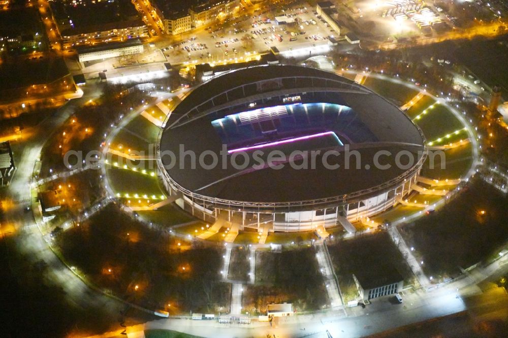 Aerial photograph at night Leipzig - Night lighting Sports facility grounds of the Arena stadium Red Bull Arena Am Sportforum in Leipzig in the state Saxony