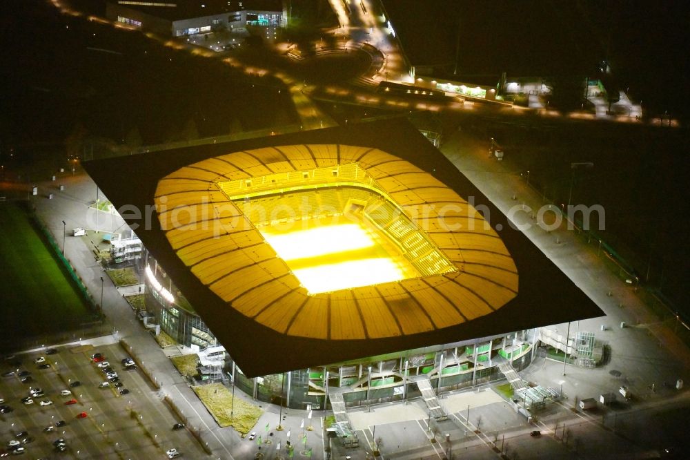 Aerial image at night Wolfsburg - Night lighting Sports facility grounds of the Arena stadium Volkswagen Arena In den Allerwiesen in the district Sonderbezirk in Wolfsburg in the state Lower Saxony, Germany