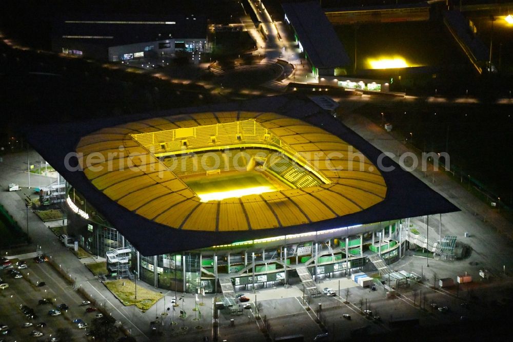 Aerial image at night Wolfsburg - Night lighting Grounds of the Arena stadium Volkswagen Arena In den Allerwiesen in the district Sonderbezirk in Wolfsburg in the state Lower Saxony, Germany