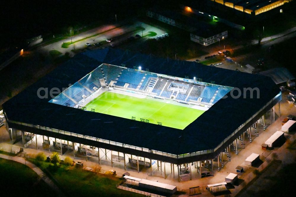 Aerial image at night Magdeburg - Night lighting sports facility grounds of the MDCC Arena stadium in Magdeburg in the state Saxony-Anhalt