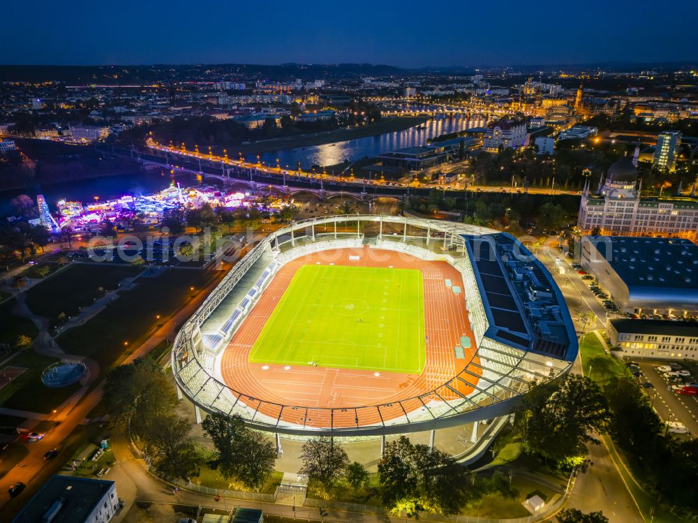 Aerial image at night Dresden - Night lighting sports facility area of the stadium Heinz-Steyer-Stadion on the street Pieschener Allee in the district of Friedrichstadt in Dresden in the federal state of Saxony, Germany