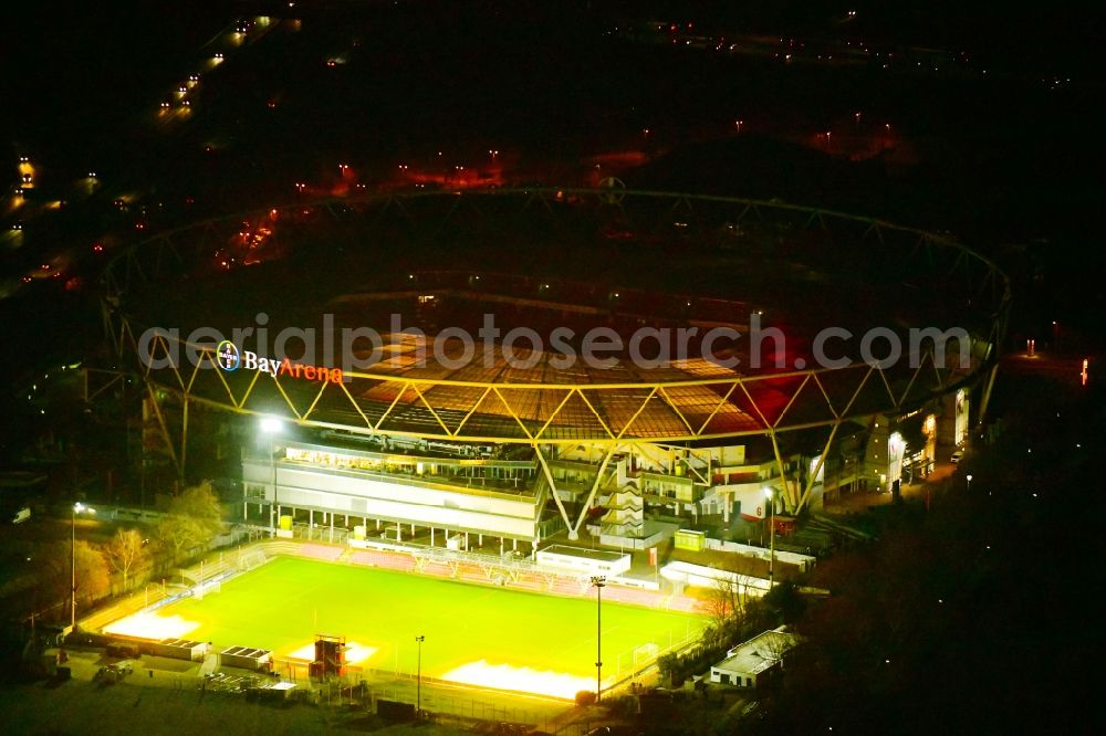 Aerial image at night Leverkusen - Night lighting sports facility grounds of the Arena stadium BayArena on Bismarckstrasse in Leverkusen in the state North Rhine-Westphalia